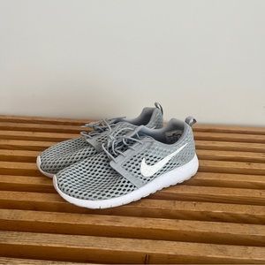 grey nike running sneakers
